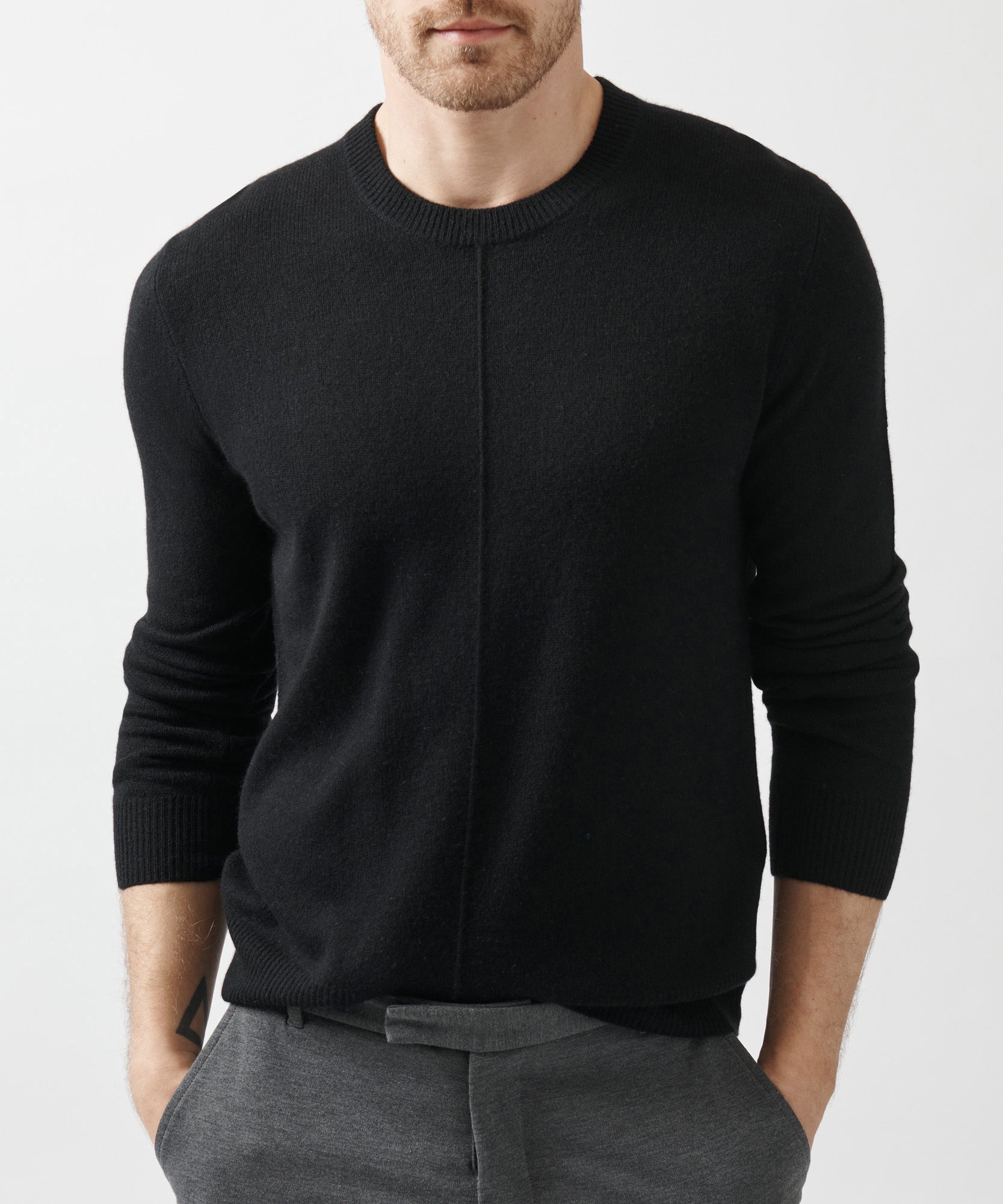https://atmcollection.com/cdn/shop/products/black-recycled-cashmere-exposed-seam-crew-neck-sweater-editorial-view.jpg?v=1658860190&width=1667